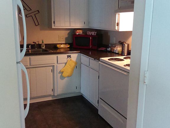 Kitchen with ceramic tile and dishwasher