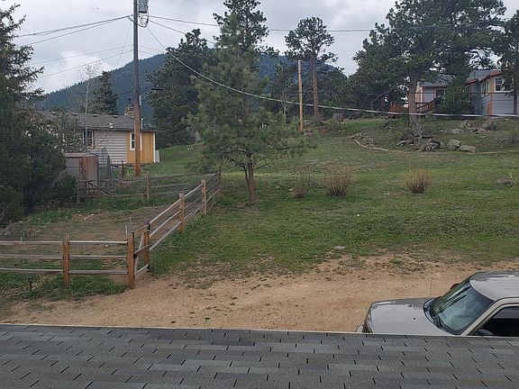 Backyard with fenced garden