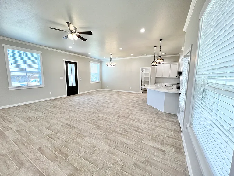 Another view of the living room, looking back toward the dining area and kitchen