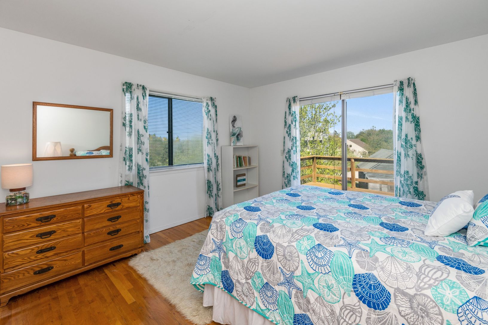  Bedroom one with sliders out to upper deck