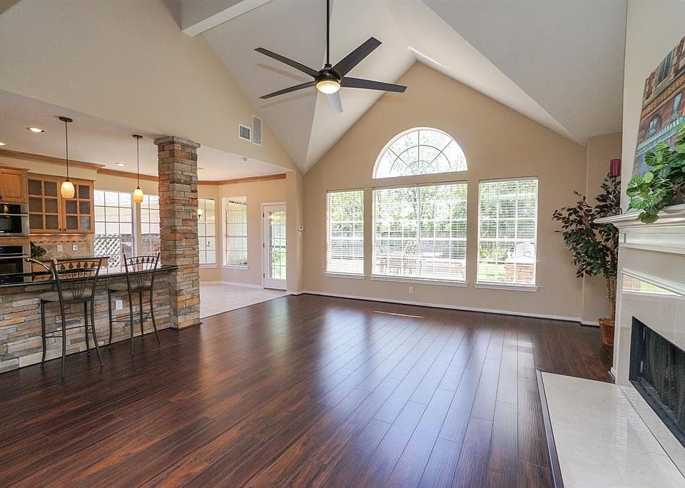 Stunning architectural design with cathedral ceilings, stack stone island and fabulous open floor plan!