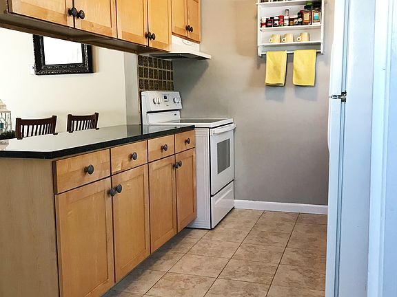 Tiled kitchen with new stove