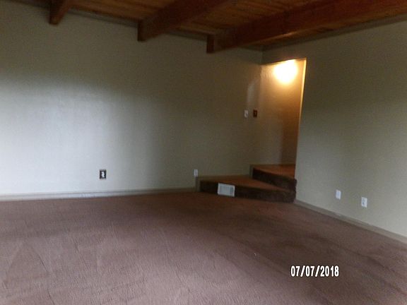 LARGE FAMILY ROOM THAT COULD BE USED AS A 4TH BEDROOM.

