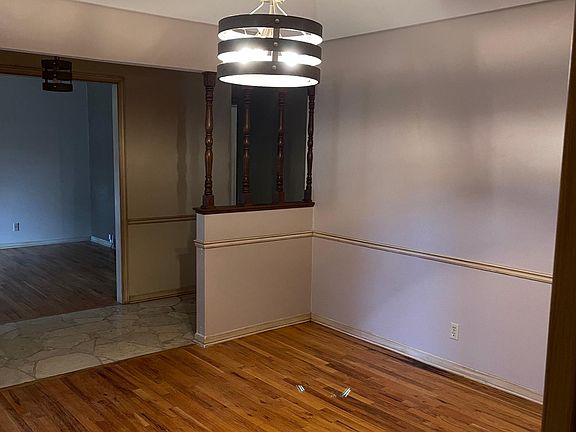 Dining room with vaulted ceiling