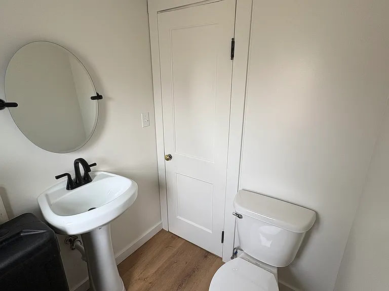 Half Bath off Kitchen/Living Area