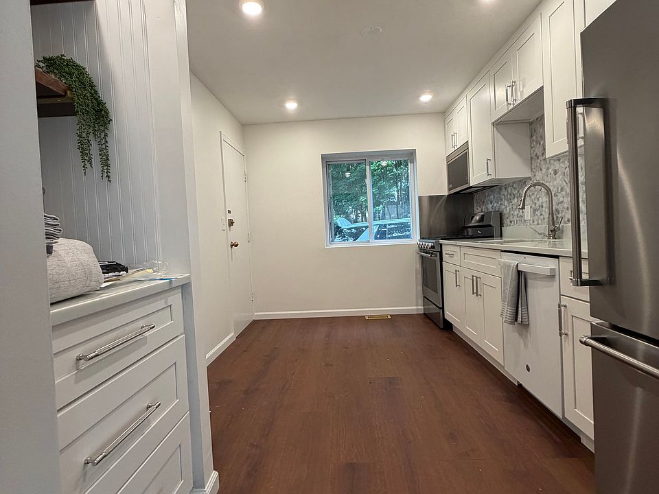 Brand new kitchen, appliances, flooring & recessed lighting. Eat-In dining area & newly built coffee bar.