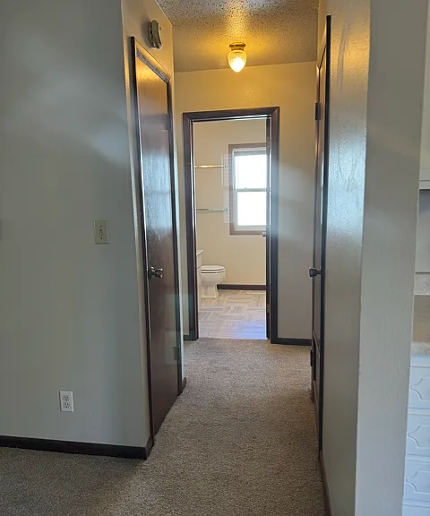 Hall closet to bedrooms and bathroom