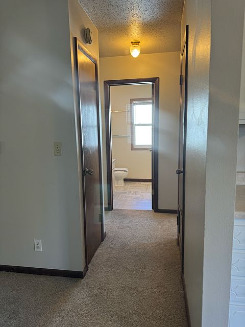 Hall closet to bedrooms and bathroom