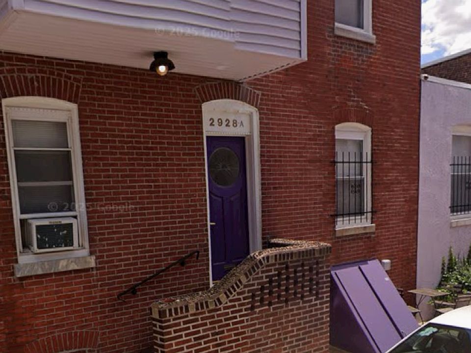 Entry to unit A. 2 bedroom 2 floor apartment. Showing access to basement laundry through cellar door.