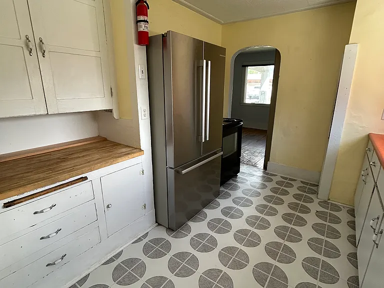 Now featuring the MVPs: a fairly new fridge ready for leftovers and a stove that's seen some things (mostly pancakes). The back counter offers extra prep space, snack staging, or your morning coffee command center. Retro charm meets everyday function!