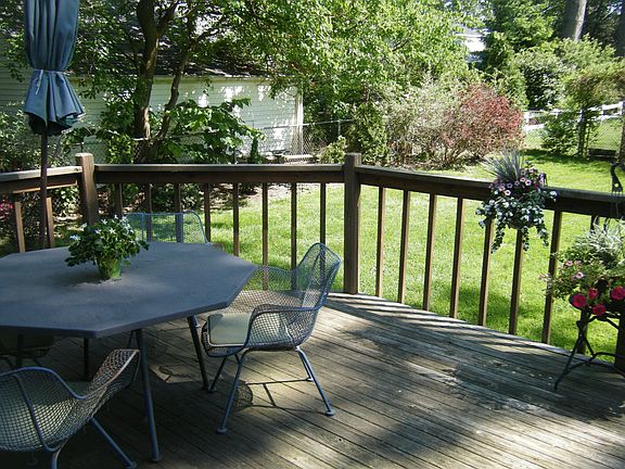 deck and fenced in yard