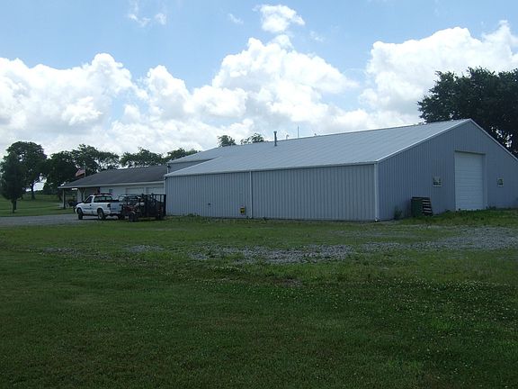 HUGE barn with oversized doors. Barn is 76x100, with an offset, heated!