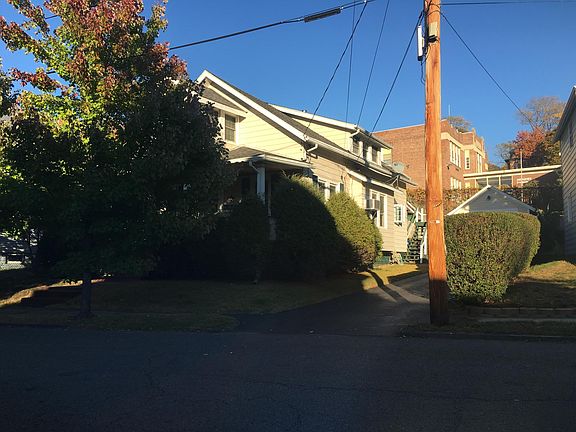 Street View, entrance to the flat is up the driveway.