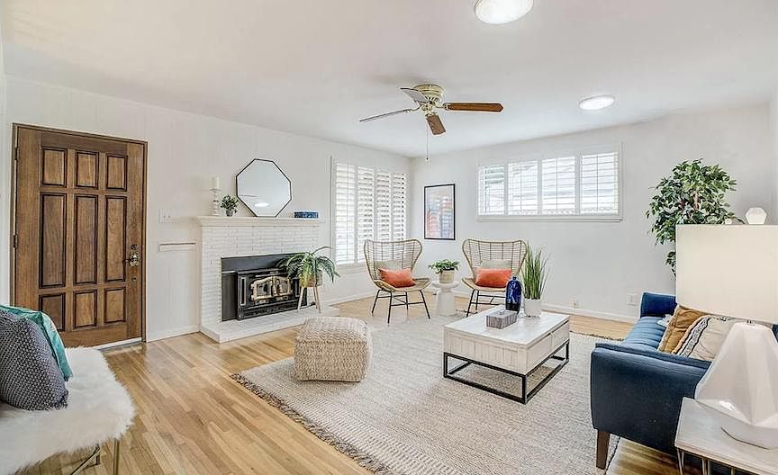 Living room with lots of natural light (furniture not included)
