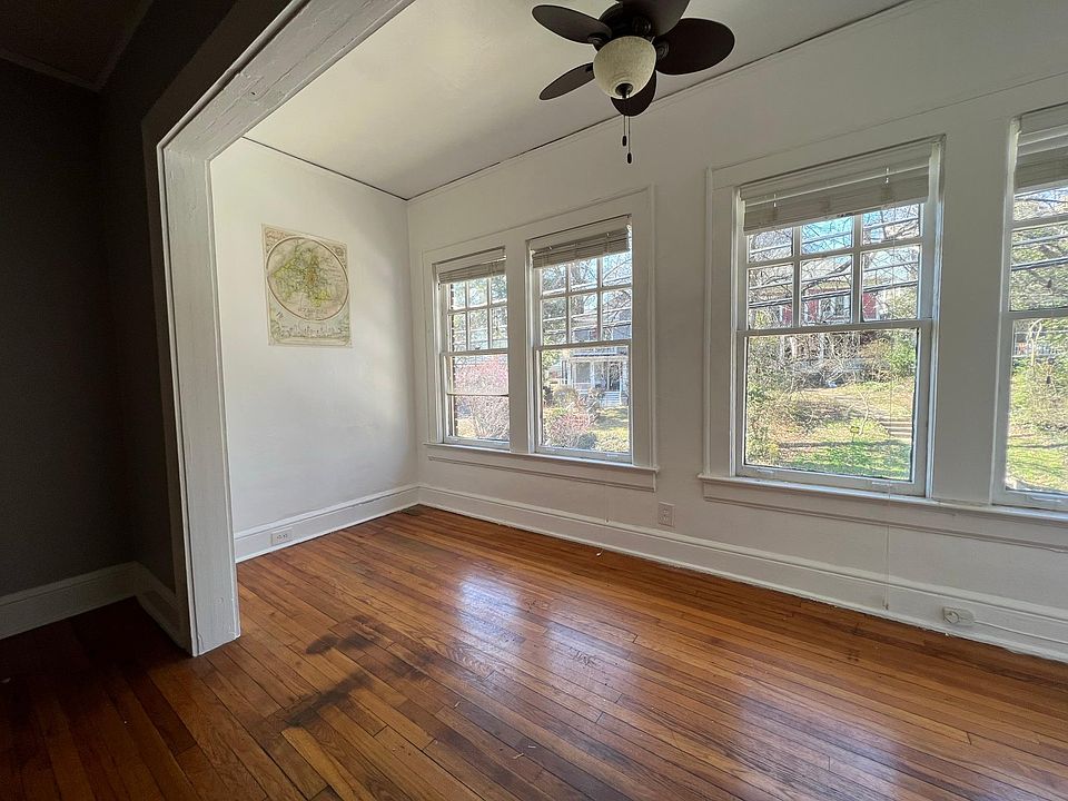 Large sun room facing N Highland Ave