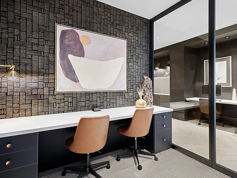 Multi-use business lounge with private work stations
