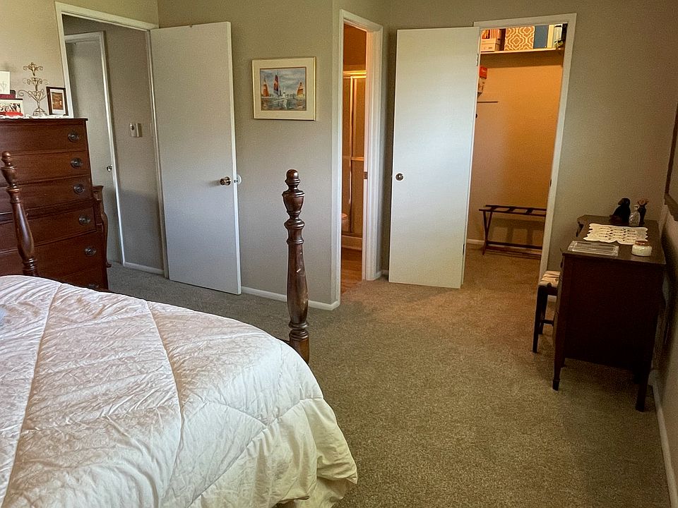 Private bathroom with shower and walk in closet.