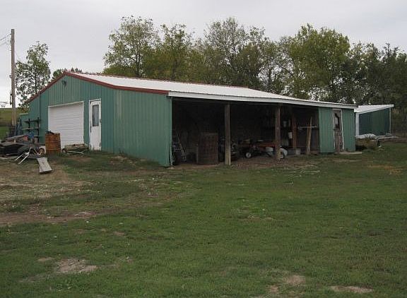 South view of shop/lean-to's