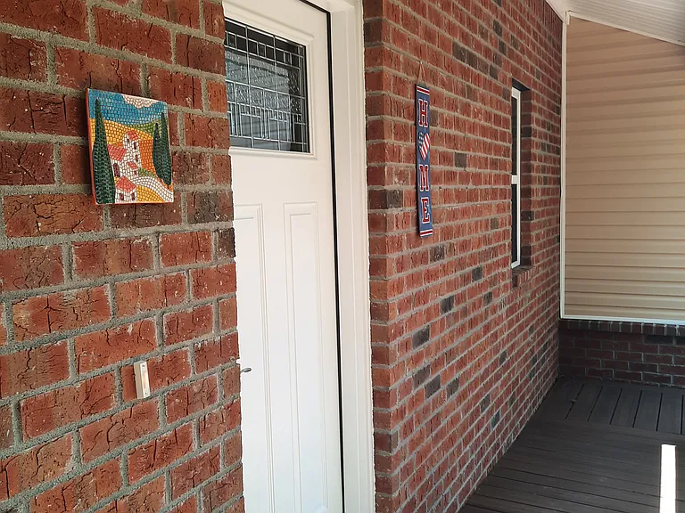 Front door and entrance ramp.