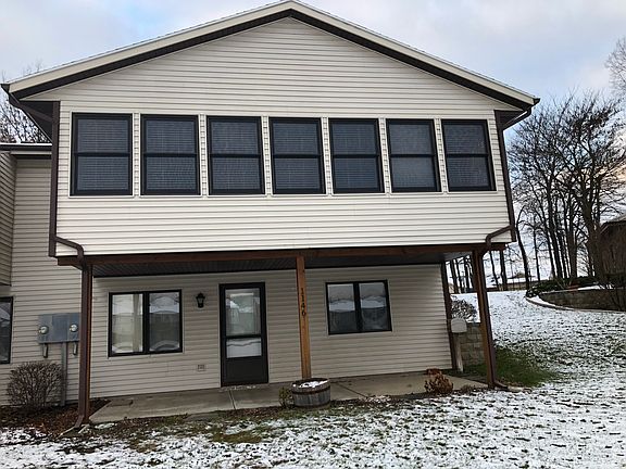 Sun room over covered patio 
