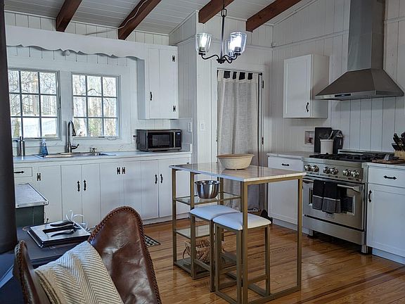 The kitchen has been newly updated with stainless steel appliances