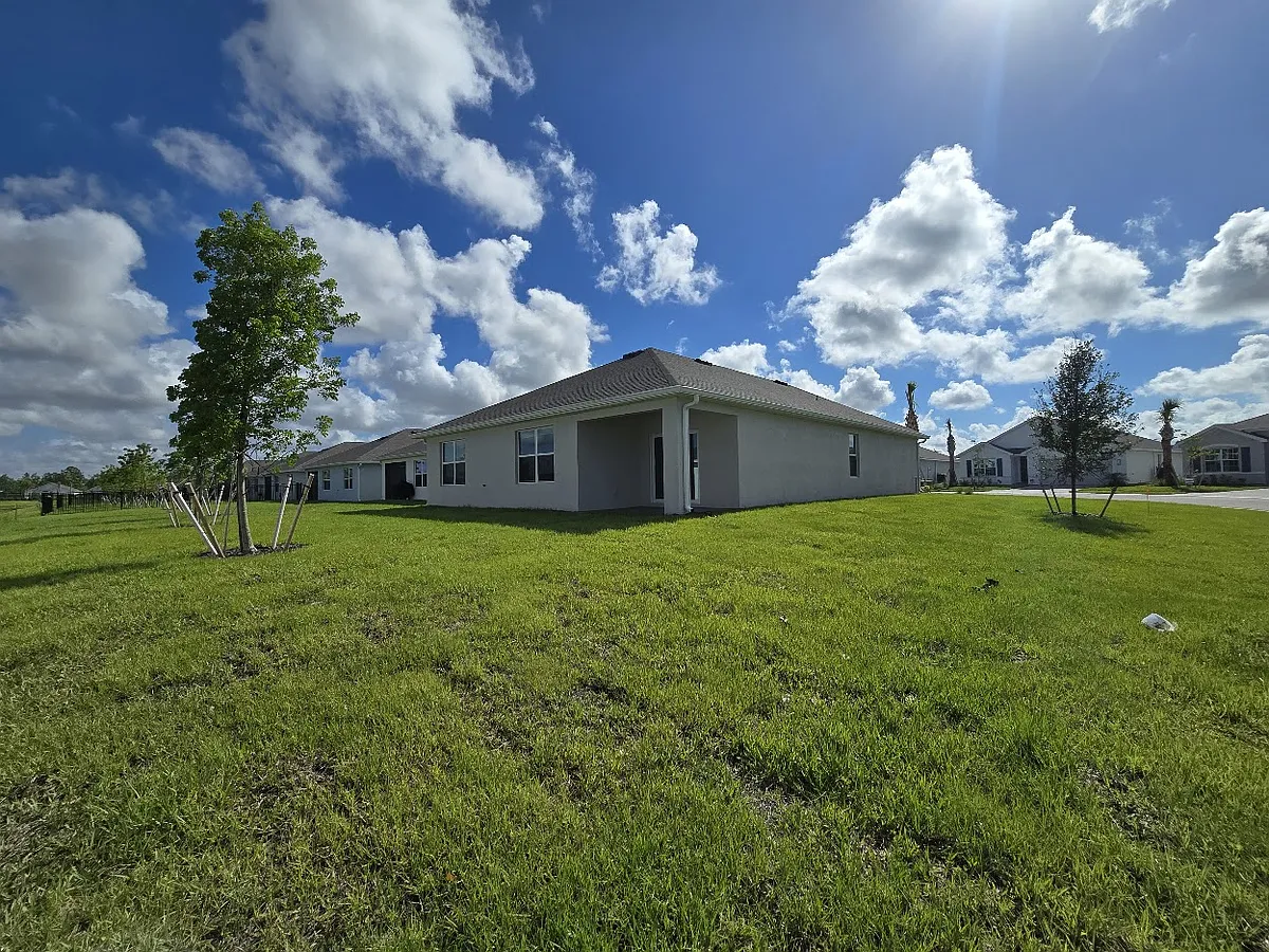Large yard. Covered screened lanai coming soon! - 9489 Turtle Grass Cir