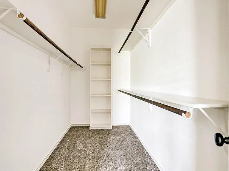 Large walk-in closet in the master with built in rack!