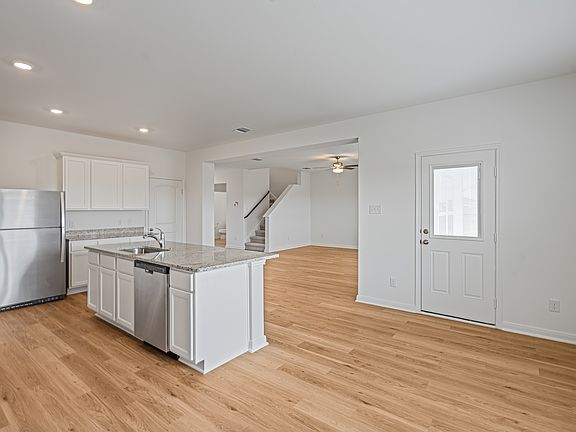 The spacious kitchen is perfect for preparing your family s favorite meals and treats.