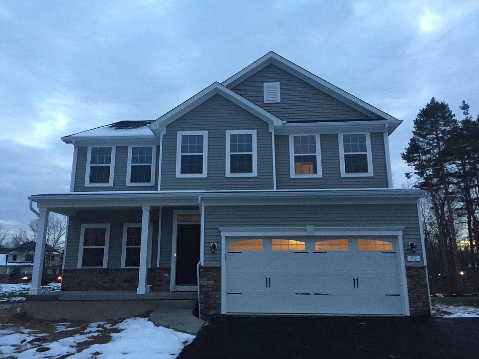 Front view of the house. The backside of the house faces a pond and woods.