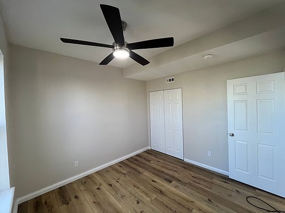HUGE bedroom with full-size closet, north-facing windows, and luxury ceiling fan with tons of light modes, colors, and fan speeds! Plus luxury cordless cloth blinds!