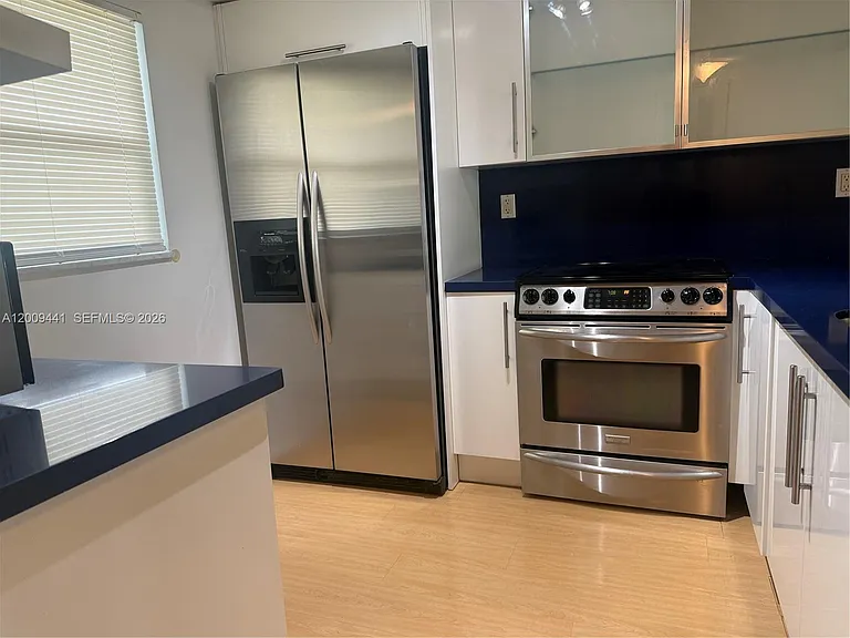 100 Edgewater Dr #236 — Photo 5
