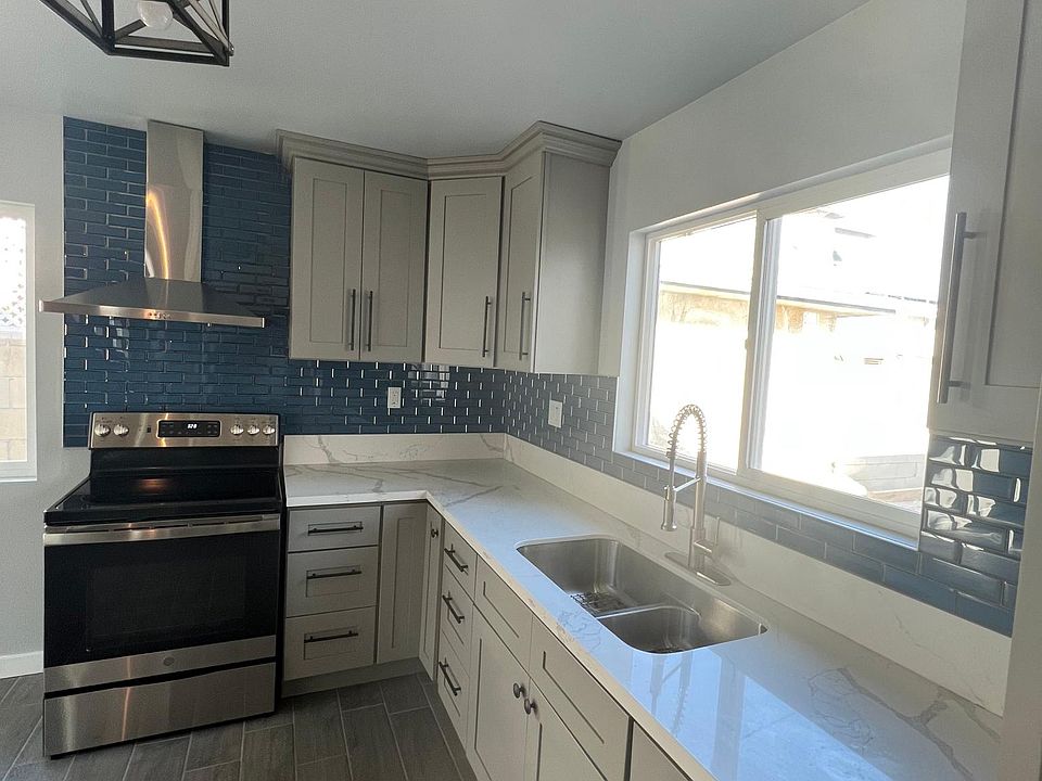Beautiful Kitchen with quartz counter tops and subway tile