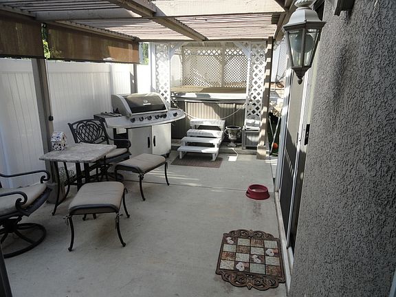 Patio with spa and gazebo