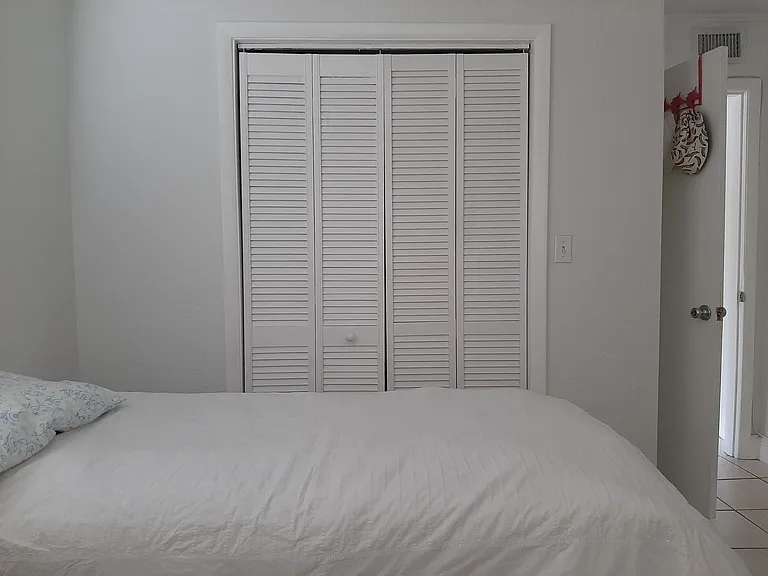 Guest or kids bedroom closet. Plenty of storage space.