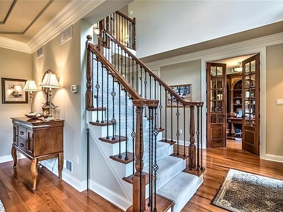 The two story foyer provides wide open access to the kitchen, family room and dining room.