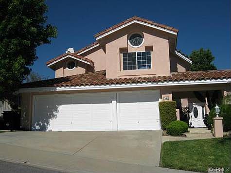 Front of home featuring new exterior paint.
