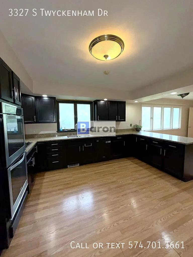 "Charming 3-Bed in South Bend with Hardwood Floors & Cozy Fireplace!" — Photo 3