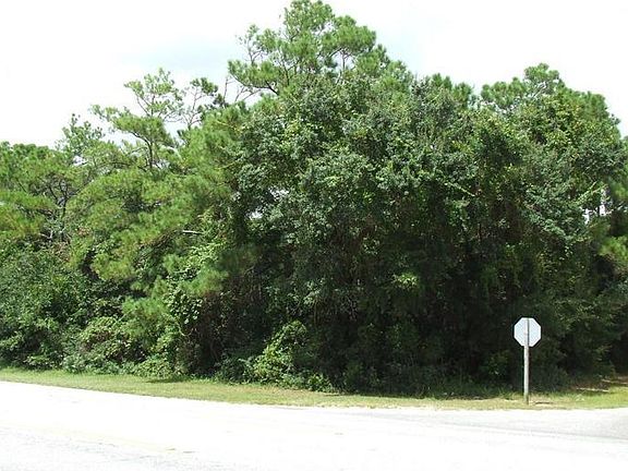 3rd image of 3408 E Oak Island + 35th St Drive LOT 4