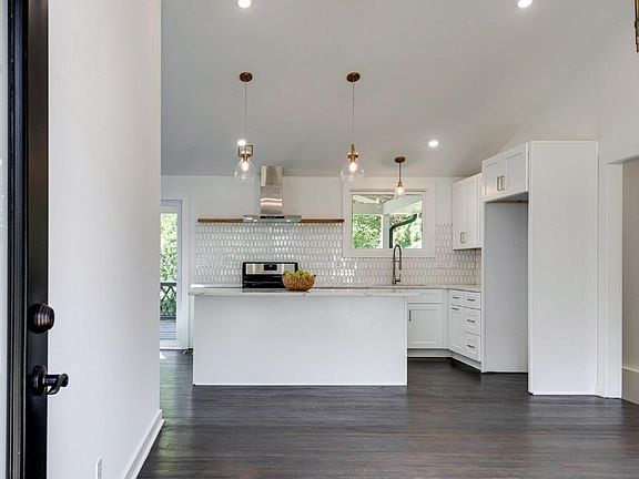 entryway- living room and kitchen