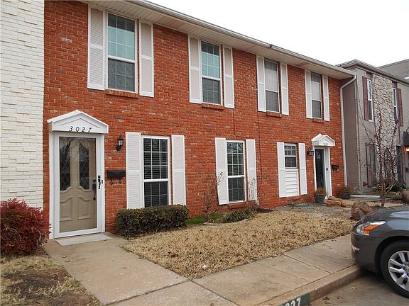 There are two townhomes in this red brick front.