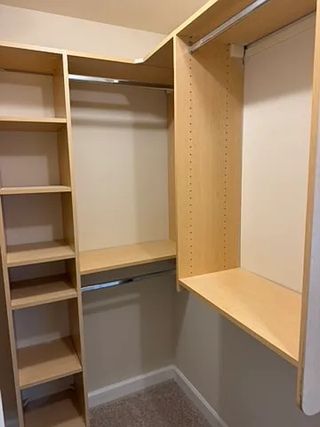 Areas to hang clothes and shelves for shoes