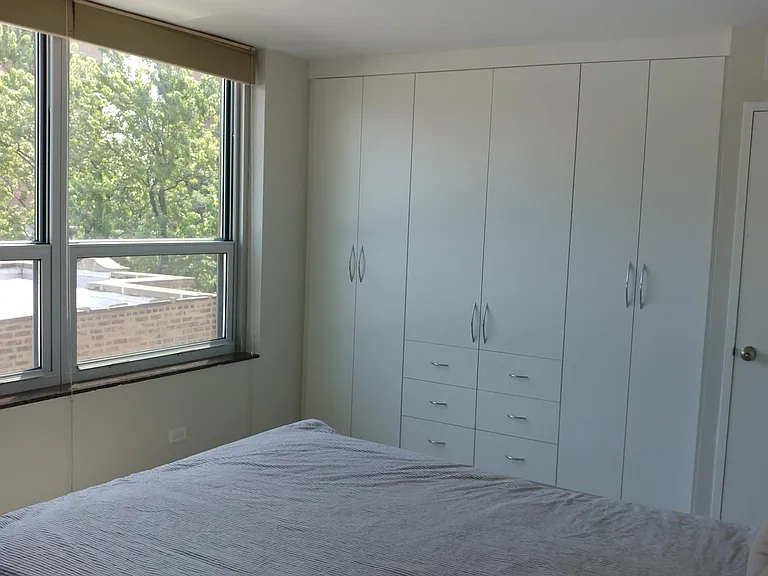 Bedroom 1 with built-in California Closets