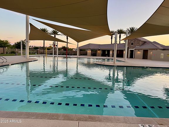 Large shaded pool area.