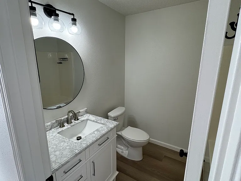 Primary bathroom with modern fixtures.