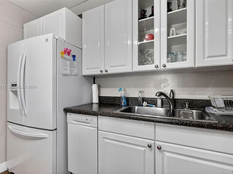 401 Golden Isles Dr #208 — Photo 11
