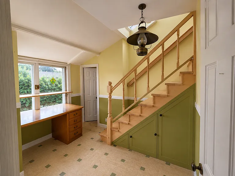 Stairway to upstairs bedroom and flex spaces _ renovation rendering