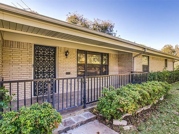 Decorative Iron Porch Rail and Storm Door