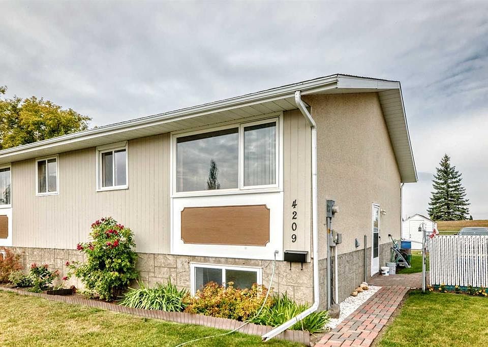 1st image of 4209 E 54th Ave