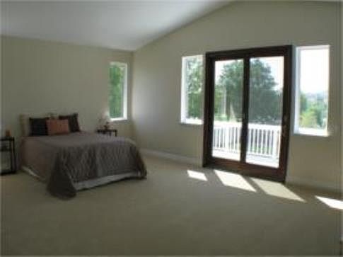 Master Bedroom with sliding door to balcony
