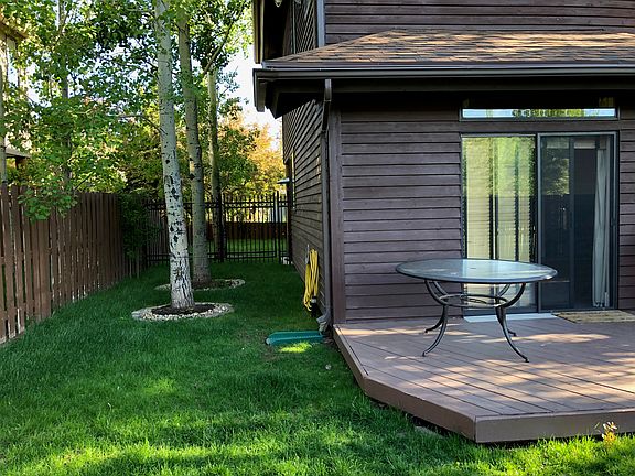 Mature trees provide privacy and shade